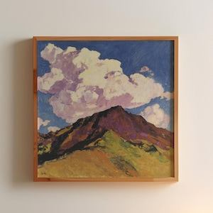 May include: Square framed painting of a mountain landscape. The mountain is a deep purple colour, with green and yellow foothills. A large, fluffy white and pink cloud sits above the mountain against a blue sky.