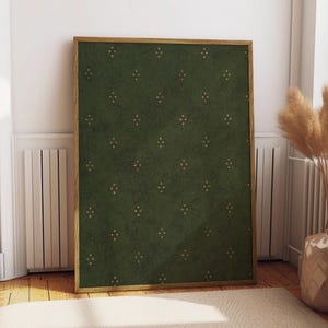 May include: A rectangular wall art piece in a light wood frame featuring a dark forest green background with a repeating pattern of small, gold-coloured diamond shapes, each composed of five tiny dots arranged in a symmetrical cross formation.