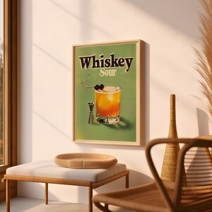 May include: A vintage-style poster with a green background featuring a glass of whiskey sour with two cherries on a stick. The text "Whiskey Sour" is printed in black letters.