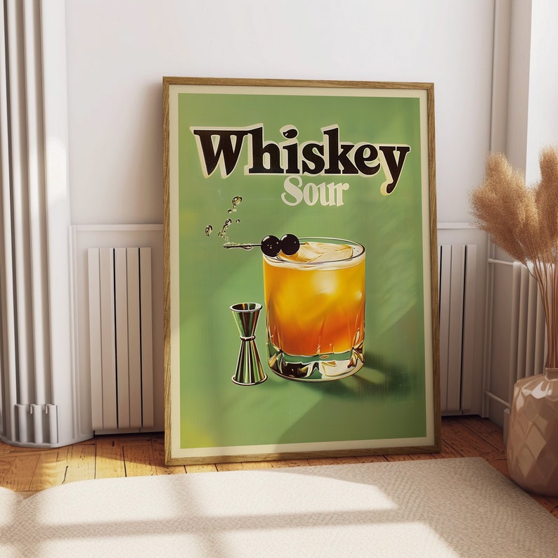 May include: A vintage-style poster with a green background featuring a glass of whiskey sour with two black cherries on a stick. The text "Whiskey Sour" is printed in black letters on the poster.