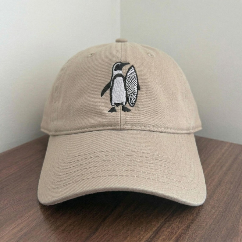 Penguin Surfer Hat, Men Women Embroidered Cap, Surf Penguin Dad Hat, Gift for Surfers, Retro Beach Style Cap, 6 Panel Low Profile Khaki