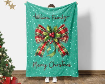 Manta navideña familiar personalizada: Regalo navideño personalizado con el apellido.