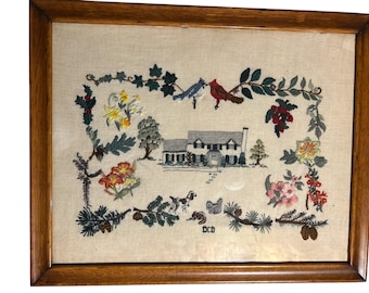 Large vintage signed framed crewel work embroidery piece 23.5x19 inches of a house, animals and flowers