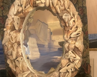 Vintage 16.5x12.5 shell decorated hanging oval wall mirror with 3 inch wide border