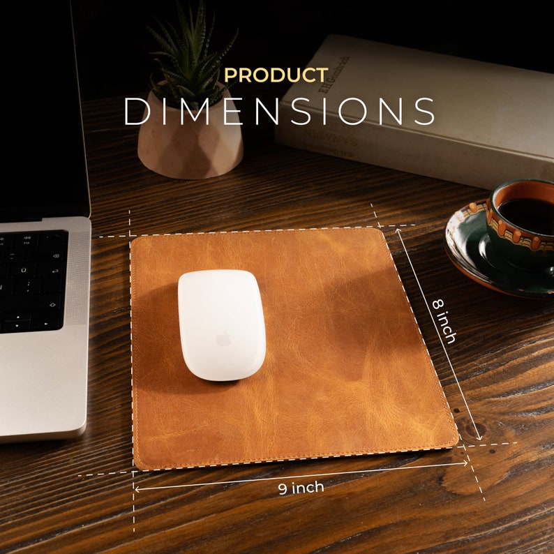 May include: A brown leather mouse mat with a white wireless mouse on top. The mouse mat measures 9 inches by 8 inches.