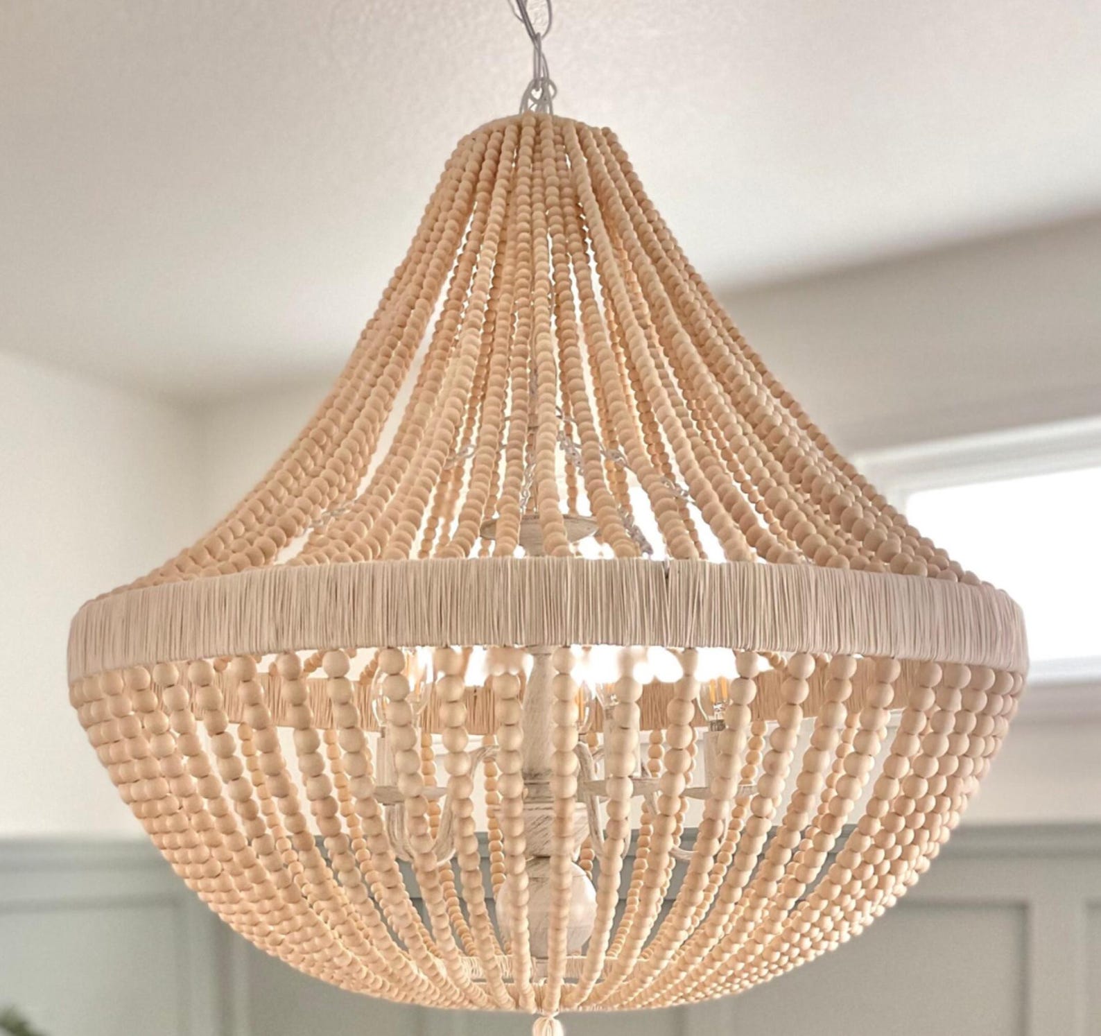 Wood bead empire chandelier for a cowgirl coastal living room