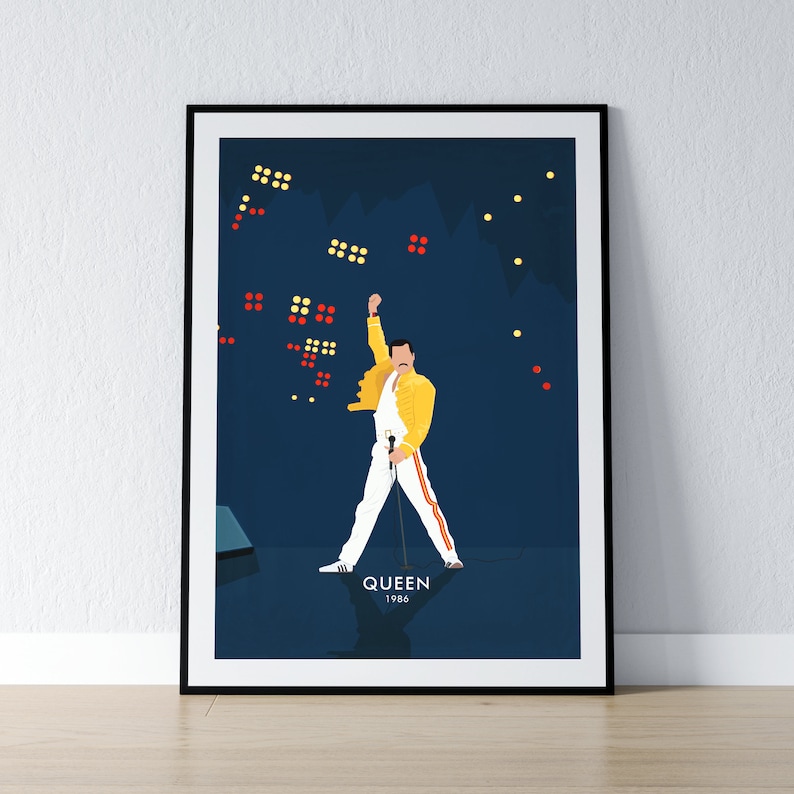 May include: A blue and white poster with a silhouette of Freddie Mercury from Queen performing on stage. The poster has the text "QUEEN 1986" at the bottom.