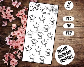 Puede incluir: Hoja imprimible con 12 contornos en blanco y negro de camisetas en perchas. Cada camiseta tiene el precio de 20 € escrito en ella. El texto "Clothes" y "Save 300 €" está en la parte superior de la hoja. El texto "Descarga instantánea imprimible" está en la parte inferior de la hoja.