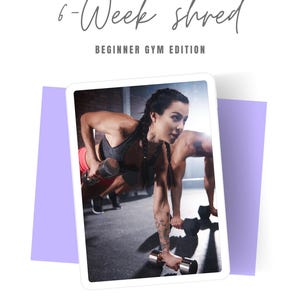 May include: A woman in a pink tank top and black leggings is doing a dumbbell push-up exercise in a gym. She is using a pair of dumbbells and has a determined expression on her face. The text "6-Week Shred Beginner Gym Edition" is displayed above the image.