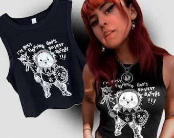 Cropped “I’m fighting god’s silliest battles!!” Clown Warrior, fitted baby tank