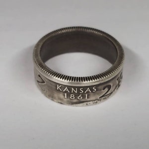 SPN supernatural Kansas state quarter with KAZ 2Y5 license plate number stamped on it. Available in 90% silver.   Ring boxes available