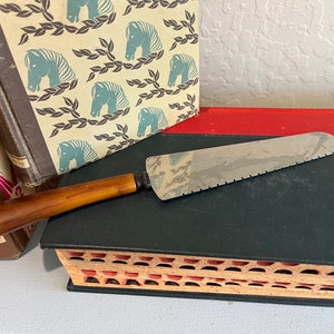 Vintage Brown Bakelite Handle Serrated Stainless Spreader Knife