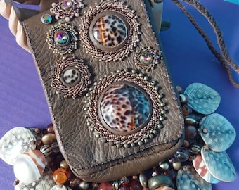 Hand beaded brown deerskin with spotted cowrie shell cabochans, tarot card bag, evening bag, statment bag