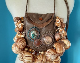 Beaded deerskin bag with shells