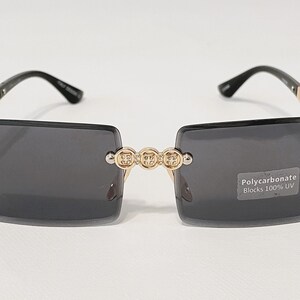 C DE RIMLESS RECTANGULAR FRAME SUNGLASSES CT0627S IN METAL