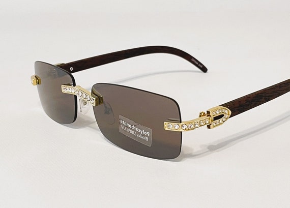 Gafas de sol rectangulares sin montura con bisagras de diamantes de imitacion patas de madera sintetica