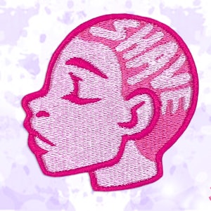 May include: A pink embroidered patch depicting a person's head in profile, with text within the hair. The patch has a solid pink border and is set against a light purple watercolour-style background.