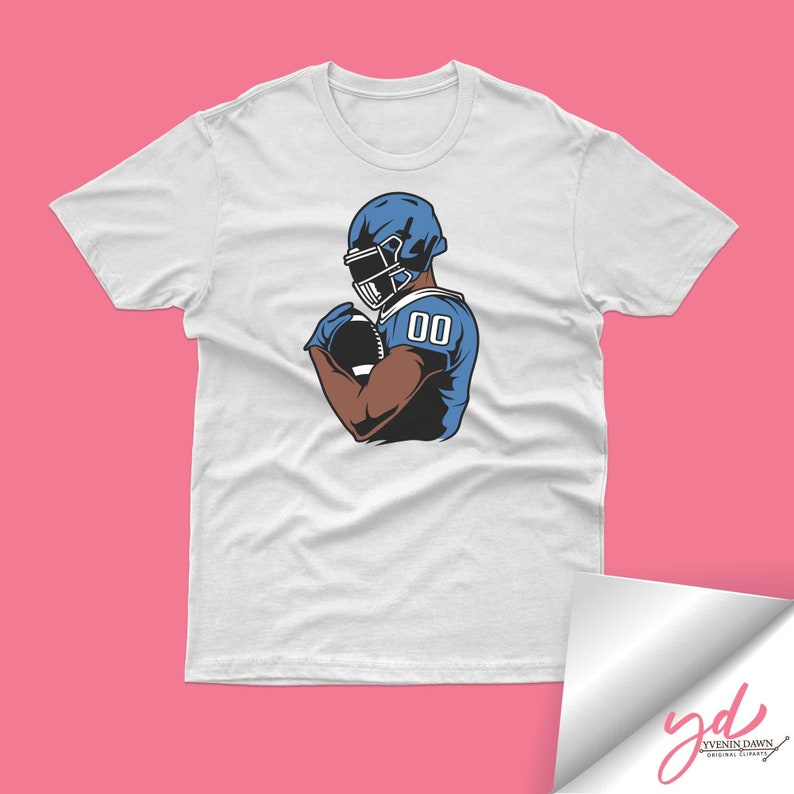 May include: White t-shirt with a graphic of a football player wearing a blue helmet and jersey with the number "00" on it.