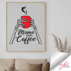 May include: A black and white illustration of skeletal hands holding a red coffee mug with steam rising from the top. The text "Mama Needs Coffee" is written below the mug.