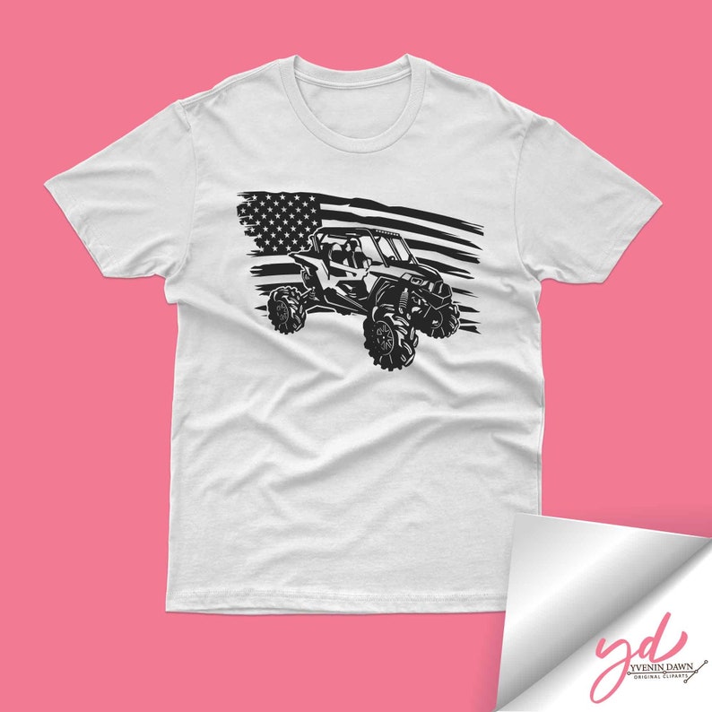 May include: White t-shirt with a black and white graphic of an off-road vehicle driving over a distressed American flag.