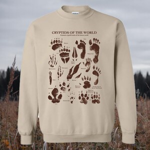 Cryptids of the World Footprints Sweatshirt, Conspiracy Monsters