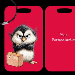 May include: Red luggage tag featuring an illustration of an angry penguin with a suitcase. The tag has a black loop for attachment and the text "Your Personalization" on the back. The penguin is black, white, and gray with an orange beak.