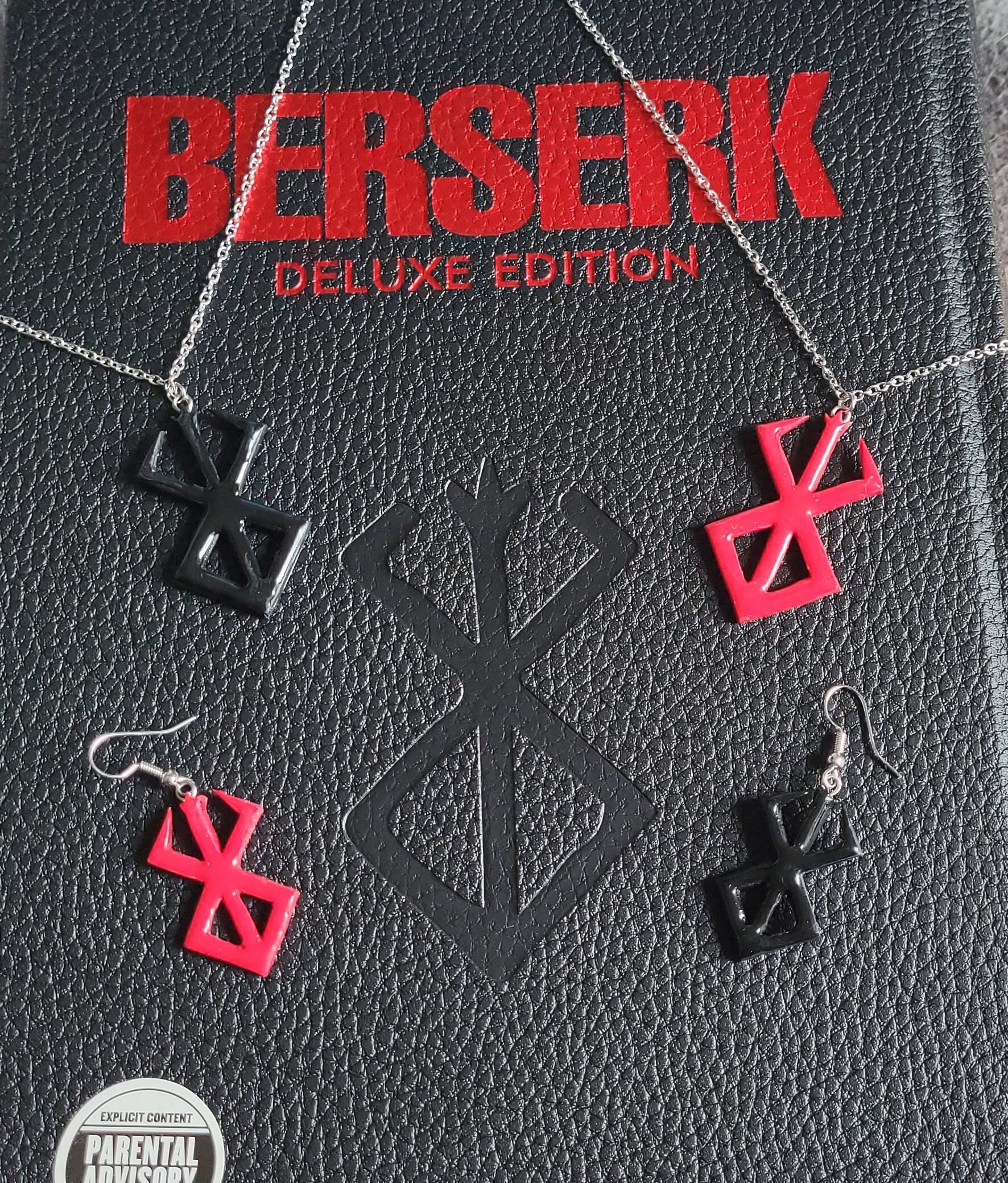 Berserk earrings deals