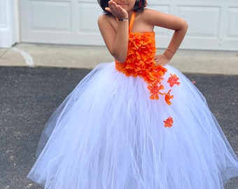 Beautiful princess flower tutu dress in orange and white.