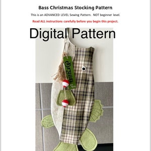 May include: A digital sewing pattern for a bass-shaped Christmas stocking. The stocking is made of plaid fabric in a green and brown colour scheme. The stocking has a green fin, a green tail, and a red and white bobber hanging from it. The stocking also has a green tag with the word "Bryan" on it.