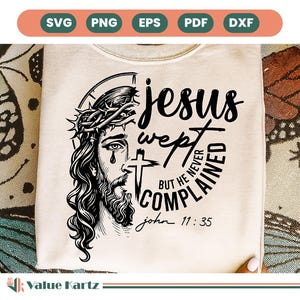 May include: Cream-colored sweatshirt featuring a black and white illustration of Jesus with a crown of thorns, a tear, and a cross. The text reads "Jesus wept but he never complained" and "John 11:35".