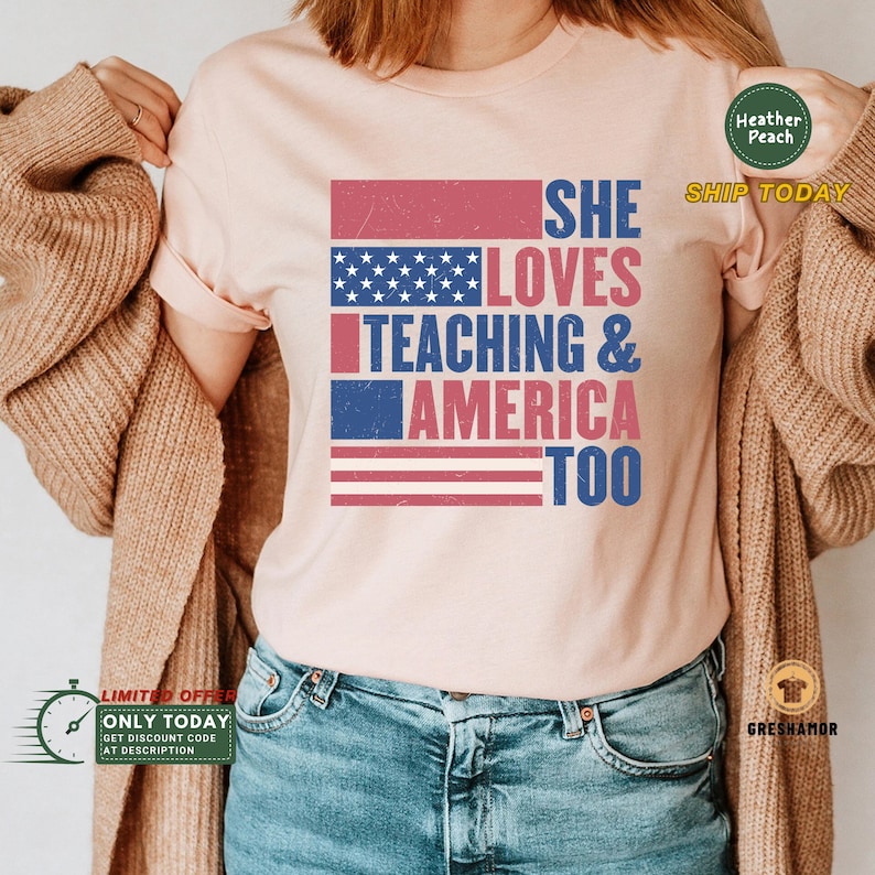 May include: A pink t-shirt with a distressed American flag design and the text "She Loves Teaching & America Too".