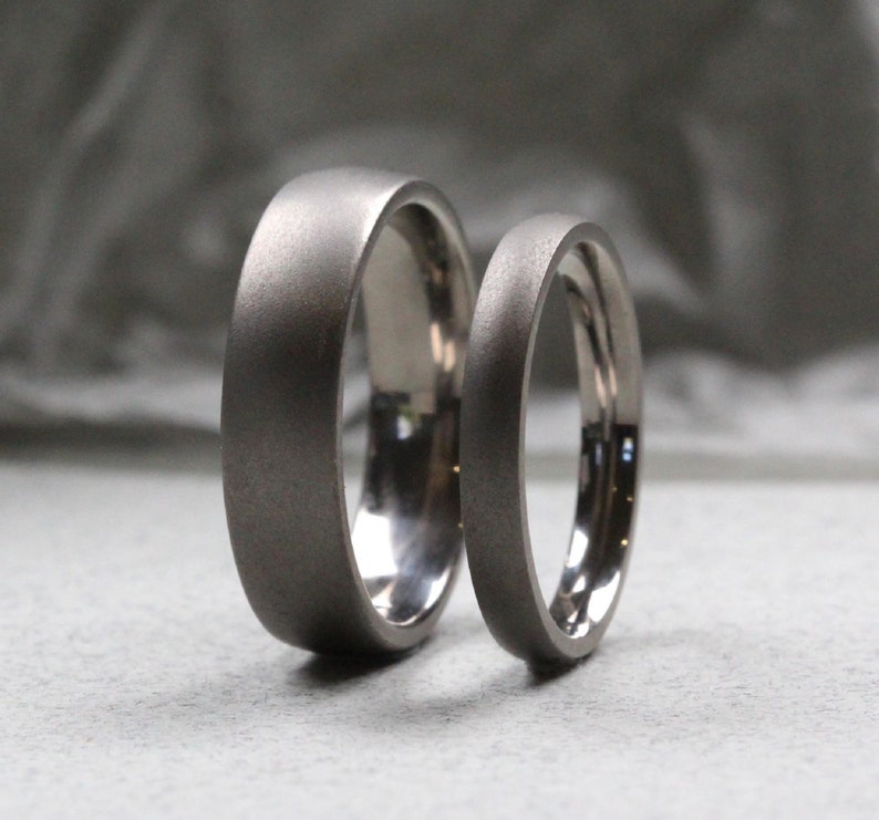 Titanium Wedding Rings Set. Ice-effect matt finish. Matching wedding rings set. Comfort fit.