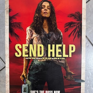 May include: A movie poster for "Send Help" featuring a woman with a serious expression against a red backdrop. The title is in large yellow letters. Text includes "Meet Linda Liddle... She's from Strategy and Planning" and "She's the Boss Now."