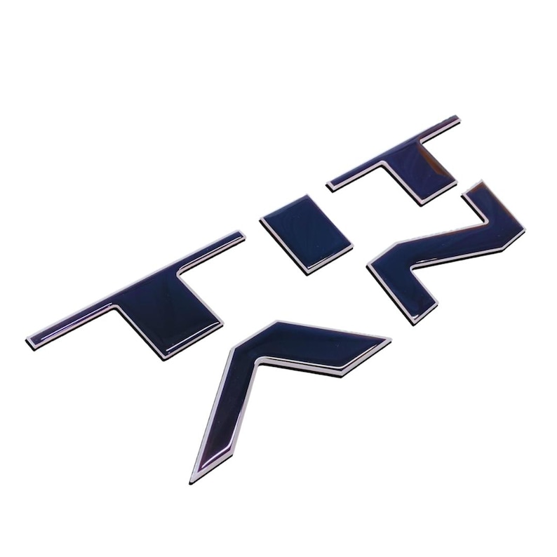 May include: Black and silver 3D letters spelling out "TRZ" in a modern font style.