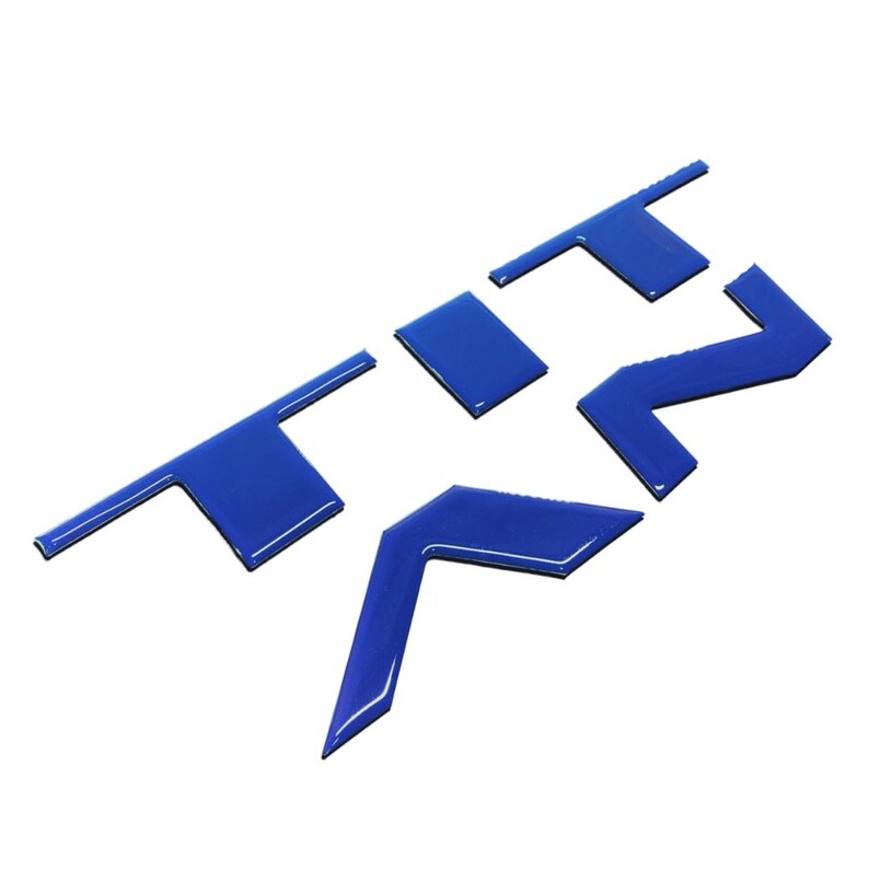 May include: Blue plastic letters spelling out the word "TRZ".