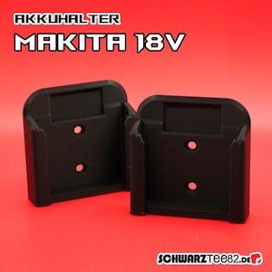 Könnte beinhalten: Zwei schwarze Batteriehalter aus Kunststoff für Makita 18V Akkus. Die Halter sind für die Montage an einer Wand oder einer anderen Oberfläche konzipiert. Der Text "AKKUHALTER MAKITA 18V" ist oben im Bild gedruckt.