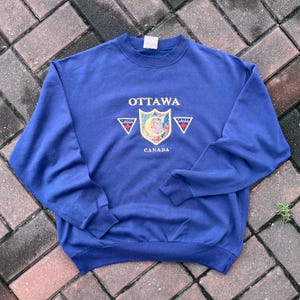 Vintage Canada Country Collection Tag Canada Montreal Big Logo Embroided Sweatshirt Crewneck Sweater Canada Colour Cream White Size Small