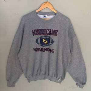 Vintage 90s Russel Tag Herricane Warning Football Spellout Big Logo Printed Sweatshirt Baggie Crewneck Pullover Colour Grey Size X-Large
