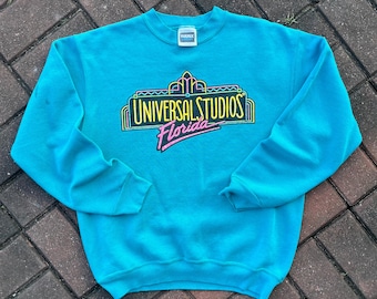 Vintage 90s Tultex Tag Universal Studios Florida Spellout  Big  Logo Printed Sweatshirt Crewneck Pullover  Florida Colour Blue Size Medium