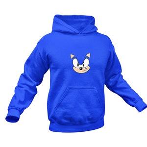 May include: A blue hoodie featuring a cartoon image of Sonic the Hedgehog's face on the front.