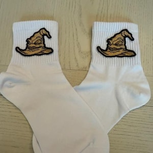 Sorting Hat Socks for the Harry Potter lover.  Ladies crew socks with embroidered emblem