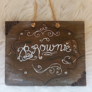 Engraved wooden sign
