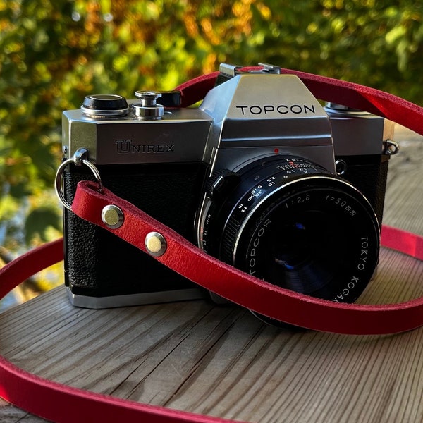 Red camera leather strap, thin, strong and resistant