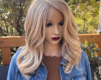 wavy caramel blonde Human Hair Blend lace front daily wig. Side parting