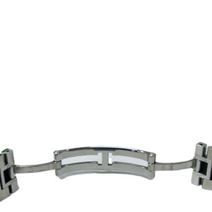 May include: A stainless steel watch clasp, featuring a polished finish. The clasp has a central hinge and two side attachments. The design is simple and modern, suitable for various watch styles.