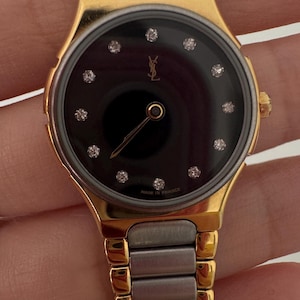 vintage womens watch YSL with  diamond authentic pre owned