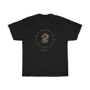 May include: Black t-shirt with a gold graphic of a rose and the quote "A rose by any other name would smell as sweet" by William Shakespeare.
