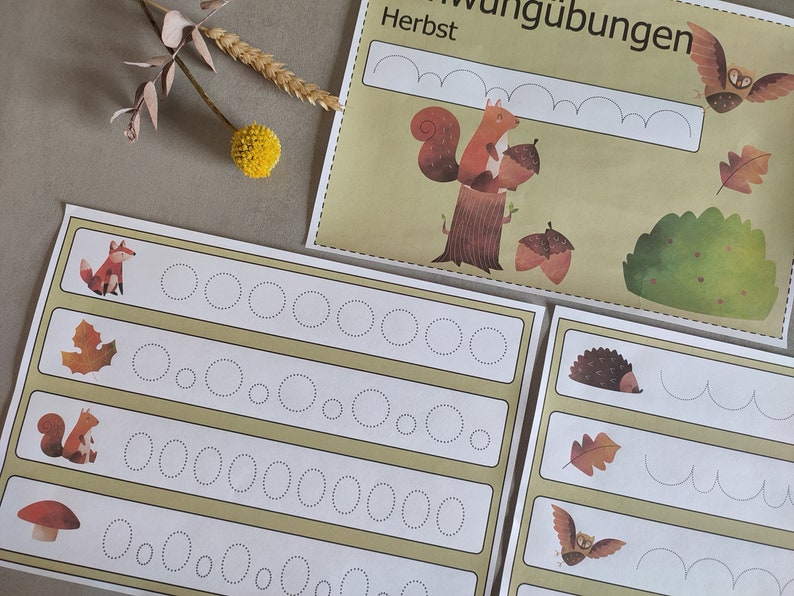 May include: Four worksheets with dotted lines for tracing circles, waves, and other shapes. The worksheets feature illustrations of a squirrel, a fox, a mushroom, a hedgehog, a leaf, and an owl. The text "Herbst" is visible at the top of one of the worksheets.