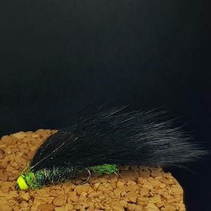 The Black Mamba. The only fly you need!!  Trout flies Streamers Lures Fly fishing Brown Rainbow Brook trout Fishing flies