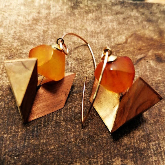 Large geometric wooden earrings with amber made by hand.